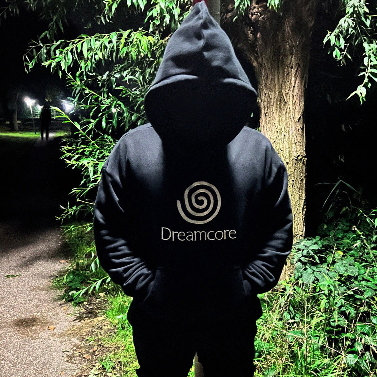 Oversized Dreamcore hoodie with embroidered design, blending weirdcore, nostalgiacore, and surreal nostalgic aesthetics inspired by late '90s visuals.